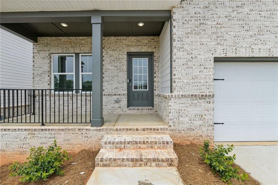 Exterior details and patio area of a home in Martin Springs - Estate Series, Lawrenceville (Image 31).