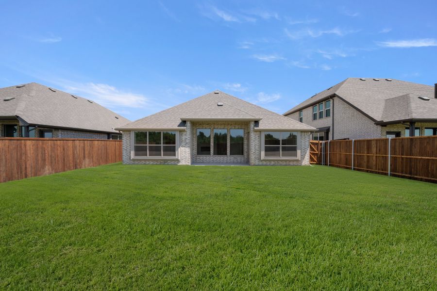 Exterior details and patio area of a home in Meadow Park at The Meadows, Ponder (Image 4). Exterior details and patio area of a home in Meadow Park at The Meadows, Ponder (Image 4).