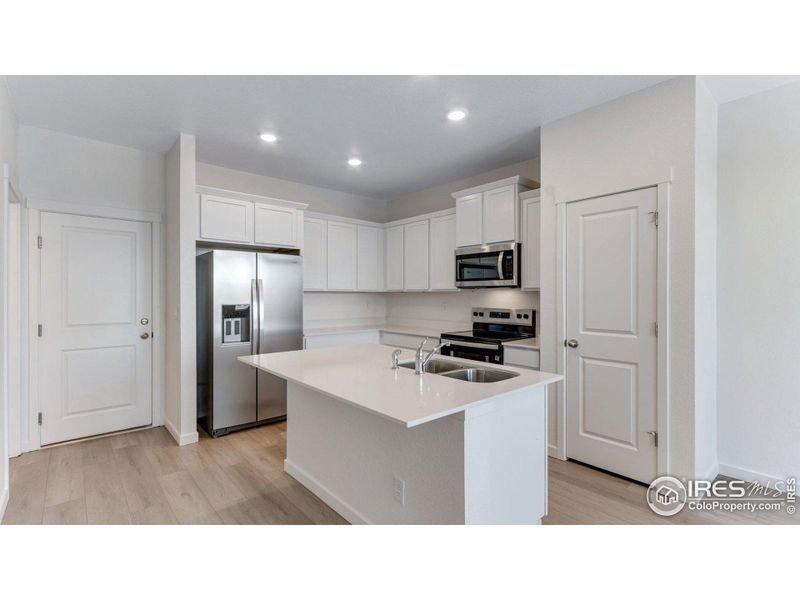 Furnished interior view inside a new home in Vista Meadows, Fort Lupton (Image 8).