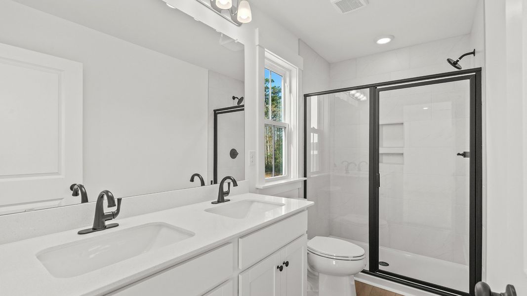 Furnished interior view inside a new home in Seabreeze Crossing, Little River (Image 13).