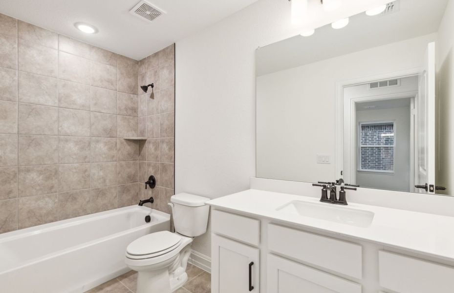 Upgraded secondary bathroom*real home pictured