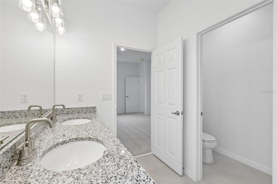 Furnished interior view inside a new home in Eagletail Landings, Howey-in-the-Hills (Image 13).