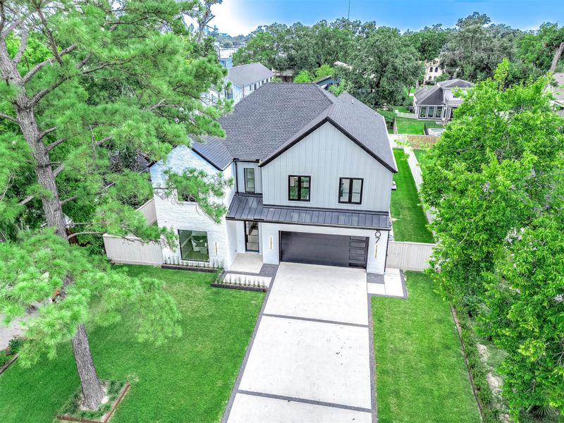 Front exterior of a new home in , Houston, TX, highlighting curb appeal (Image 2).