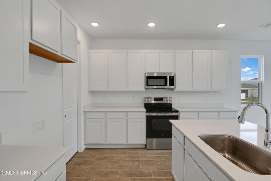 Furnished interior view inside a new home in Seasons at Grandview Gardens, Deland (Image 5).