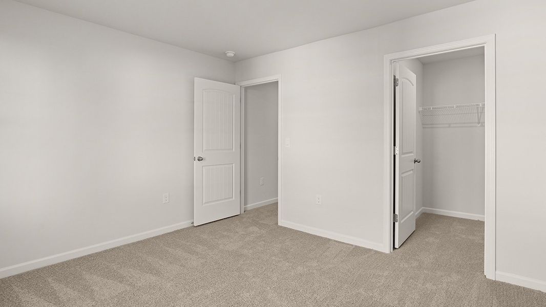 Representative unfurnished interior of a home built from the Mansfield by D.R. Horton in Liberty Crossing, Braselton (Image 30).