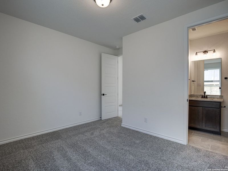 Spacious, unfurnished interior of a new home in The Reserve at Potranco Oaks, Castroville (Image 40).