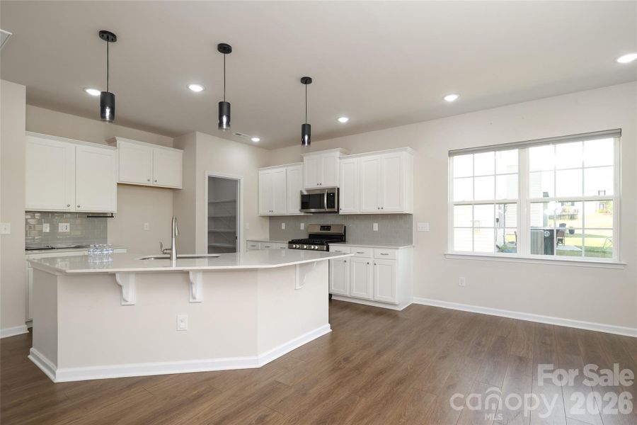 Open kitchen with dining