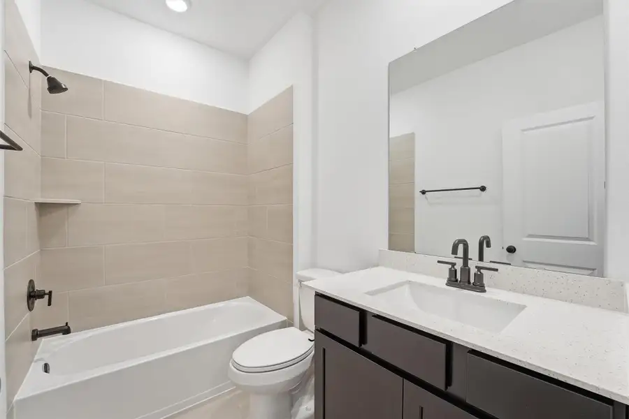 Furnished interior view inside a new home in Bridgeland, Cypress (Image 8).