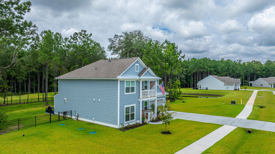 Front exterior of a new home in Sea Island Preserve, Johns Island, SC, highlighting curb appeal (Image 32).