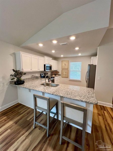 Furnished interior in a model home at Muldoon Pointe in Pensacola (Image 9).