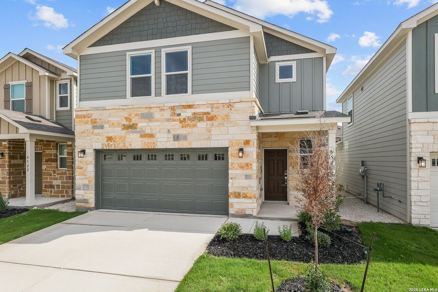 Front exterior of a new home in Senna, Leon Valley, TX, highlighting curb appeal (Image 1). Front exterior of a new home in Senna, Leon Valley, TX, highlighting curb appeal (Image 1).