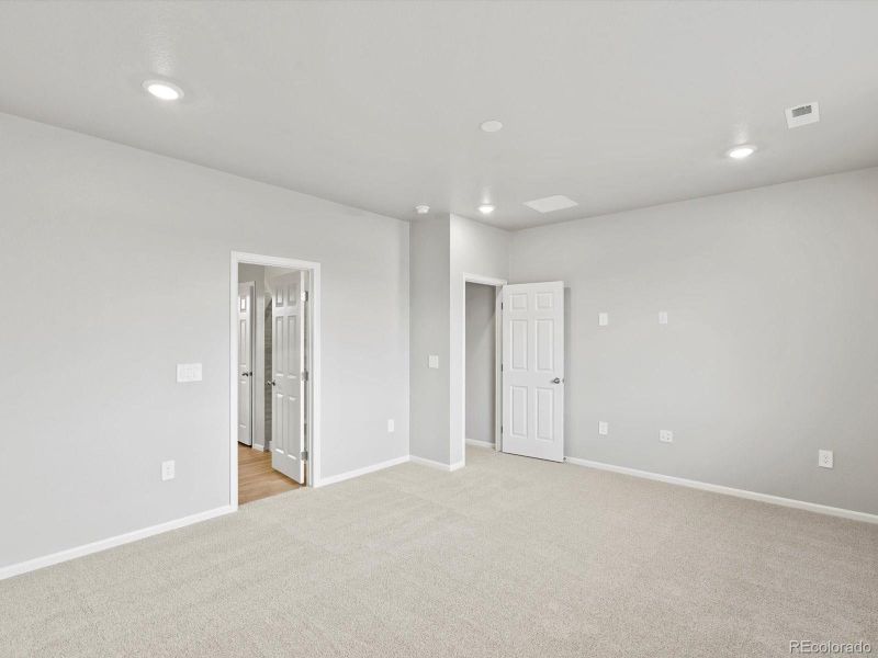 Spacious, unfurnished interior of a new home in Poudre Heights: The Alpine Collection, Windsor (Image 25).