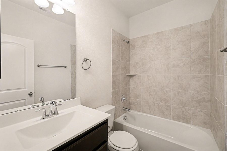 Furnished interior view inside a new home in Clear View Estates, Willis (Image 8).