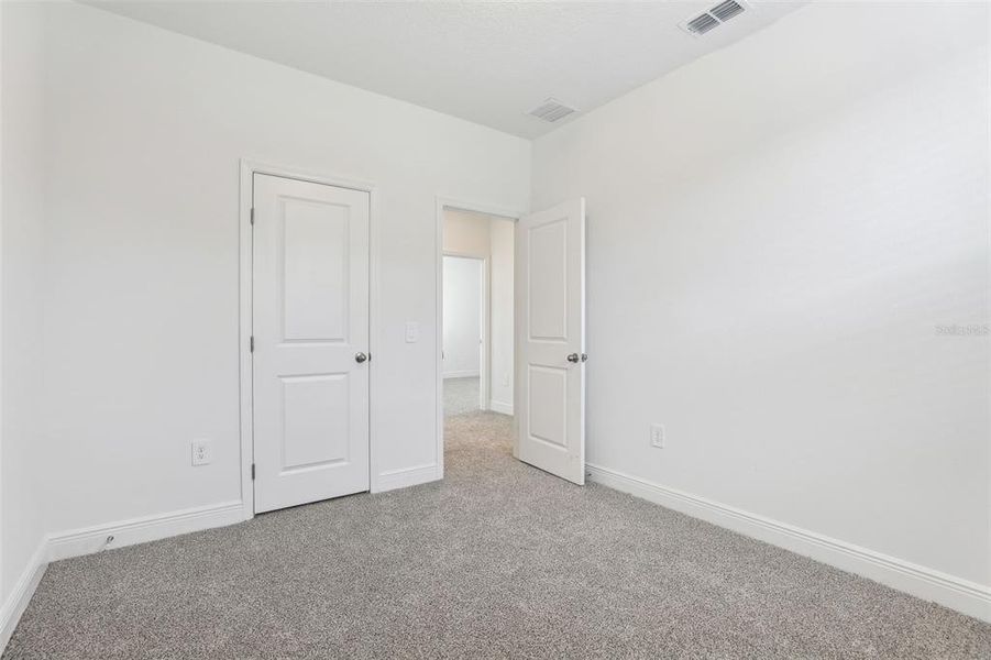 Spacious, unfurnished interior of a new home in Cyrene at Minneola - Villas, Minneola (Image 32).