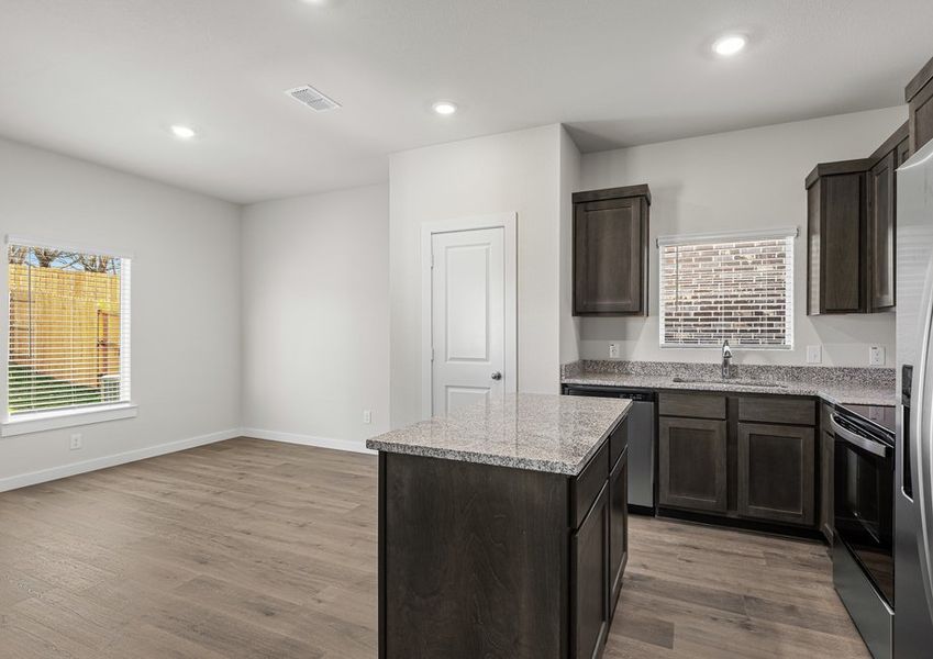 The dining room sits right off of the kitchen.