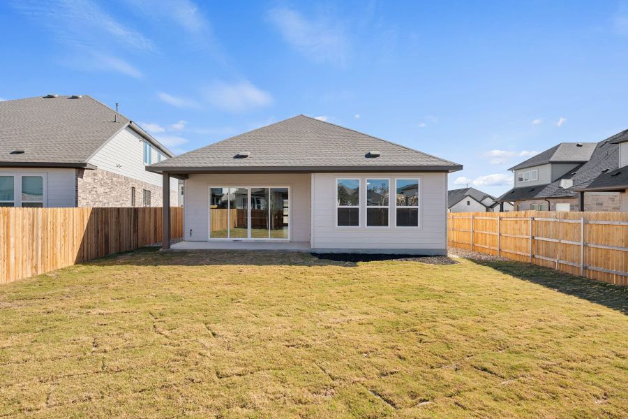Exterior details and patio area of a home in Heritage, Dripping Springs (Image 24).