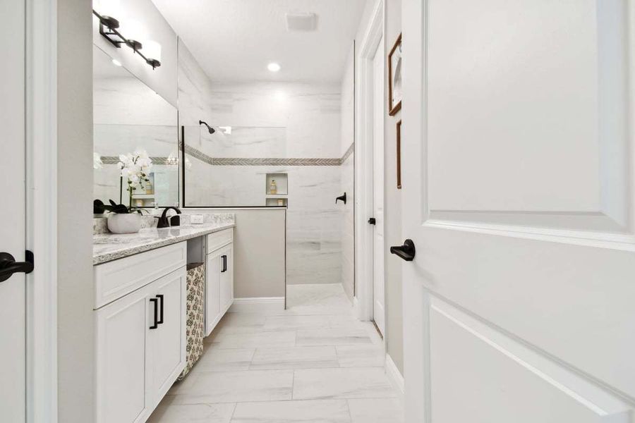 Representative furnished interior of a home built from the Sandpiper by William Ryan Homes in Fairway Pointe - Villa Community, Sun City Center (Image 18).
