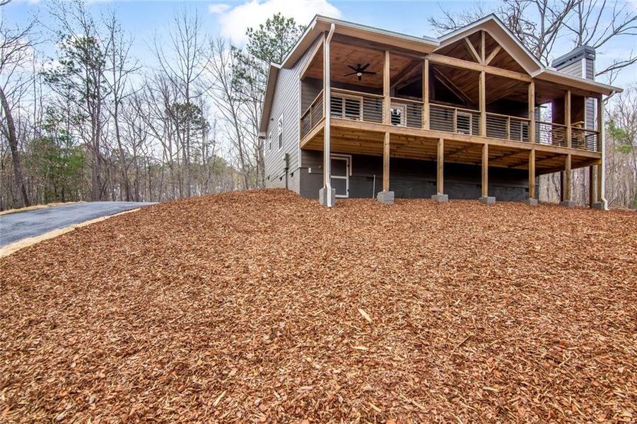 Exterior details and patio area of a home in , Ellijay (Image 32).