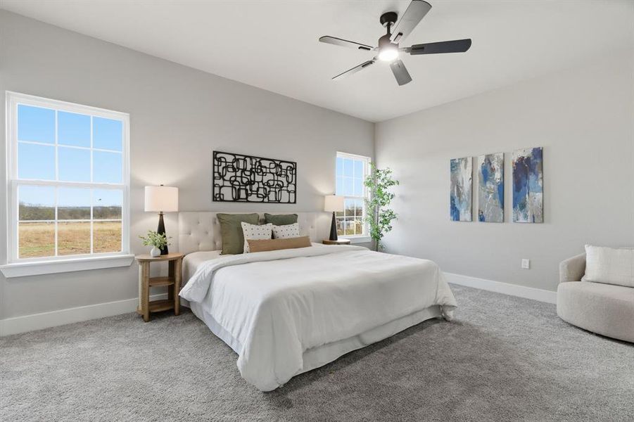 Bedroom with carpet flooring and a ceiling fan
