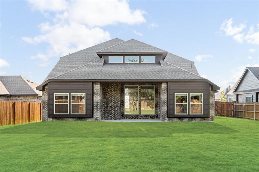 Front exterior of a new home in Sunrise at Garden Valley 60-79, Waxahachie, TX, highlighting curb appeal (Image 25). Front exterior of a new home in Sunrise at Garden Valley 60-79, Waxahachie, TX, highlighting curb appeal (Image 25).