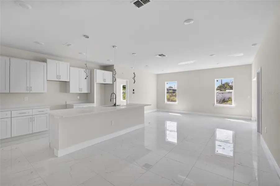 Spacious, unfurnished interior of a new home in , Port Charlotte (Image 17).