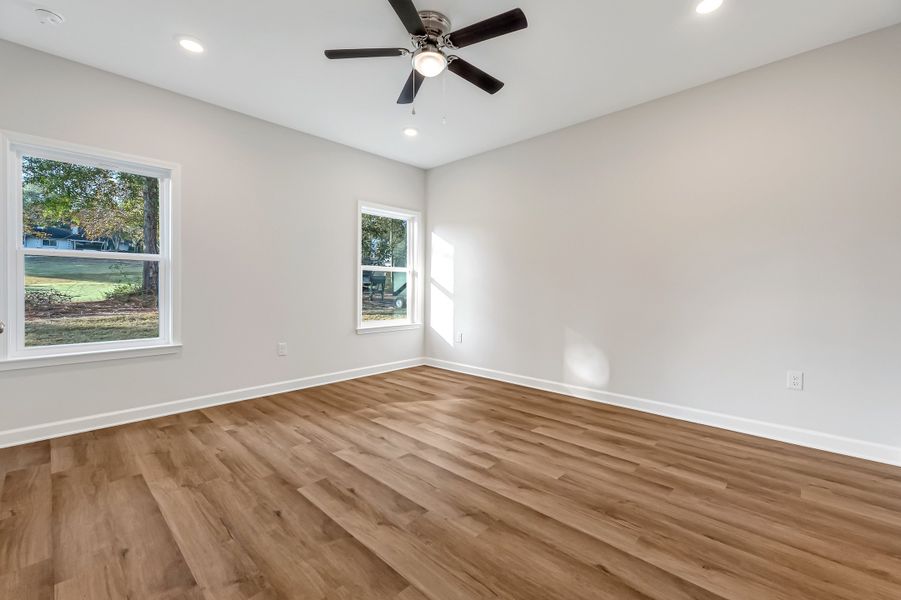 Spacious, unfurnished interior of a new home in Southern Charm, Crestview (Image 23).