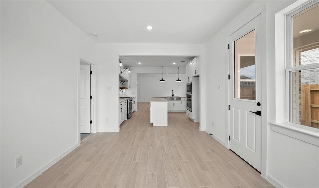 View of dining room and kitchen (*Photo not of actual home and used for illustration purposes only.)