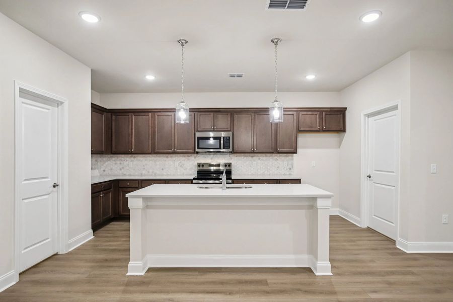 Furnished interior view inside a new home in Stewart's Glen | 55+ Community, Smyrna (Image 8). Furnished interior view inside a new home in Stewart's Glen | 55+ Community, Smyrna (Image 8).