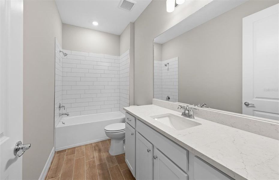 Furnished interior view inside a new home in The Strand at Cedar Grove, North Port (Image 10).