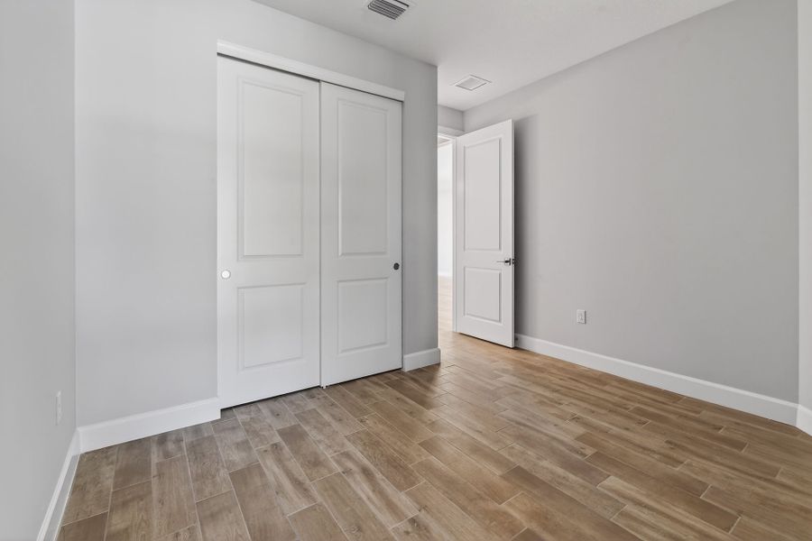 Spacious, unfurnished interior of a new home in Costa Pointe, Vero Beach (Image 52).