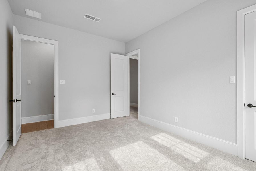 Spacious, unfurnished interior of a new home in Sienna 65' Homesites, Missouri City (Image 24).