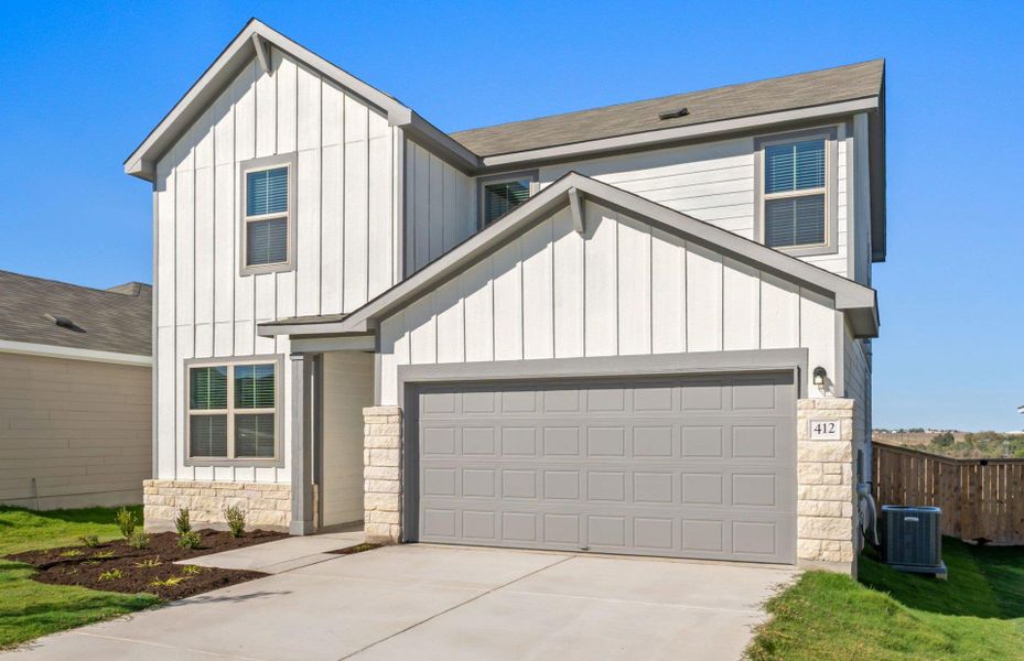 Front exterior of a new home in Sonterra, Jarrell, TX, highlighting curb appeal (Image 2). Front exterior of a new home in Sonterra, Jarrell, TX, highlighting curb appeal (Image 2).