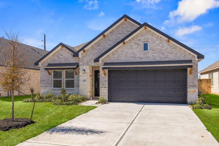 Front exterior of a new home in Ashland, Houston, TX, highlighting curb appeal (Image 18).