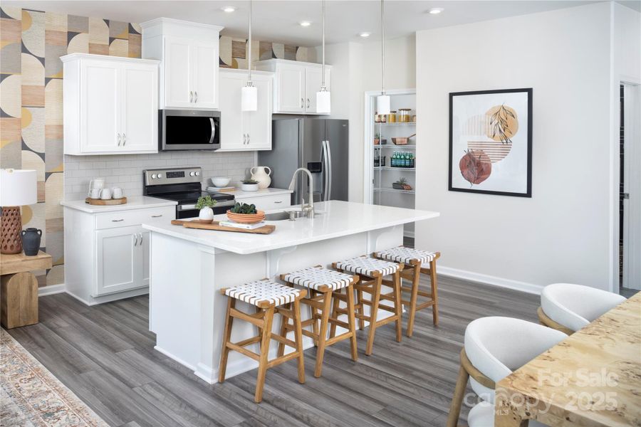Kitchen-Adriana Decorated Model Home-like subject property