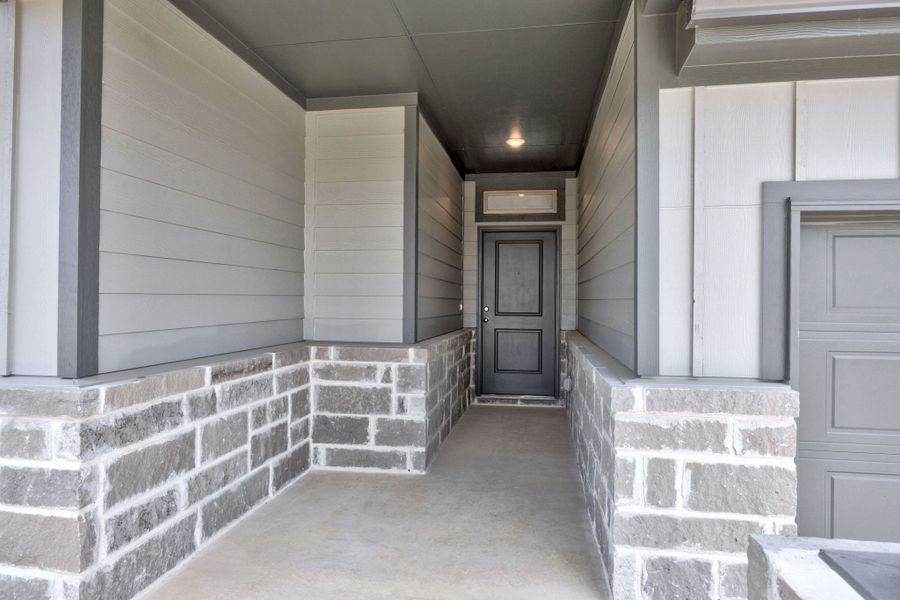 Exterior details and patio area of a home in Prairie Winds, Hutto (Image 3).