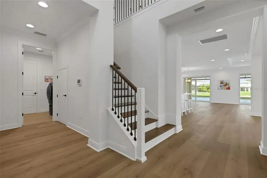 Spacious, unfurnished interior of a new home in Cassata Lakes, Nokomis (Image 60).