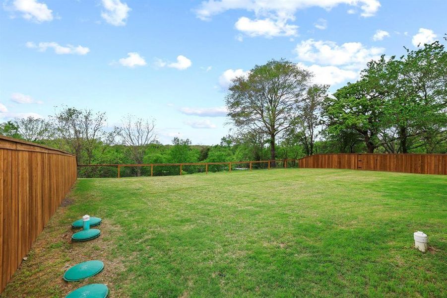Exterior details and patio area of a home in , Denison (Image 20). Exterior details and patio area of a home in , Denison (Image 20).