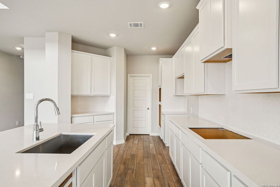 Furnished interior view inside a new home in Estancia Ranch - Classic Series, San Antonio (Image 10).