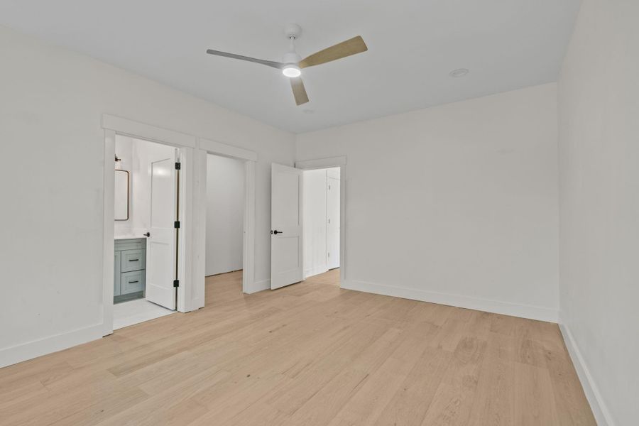 This inviting second floor bedroom offers perfect blend of comfort and convenience , featuring its own attached bathroom for added pricey and ease .