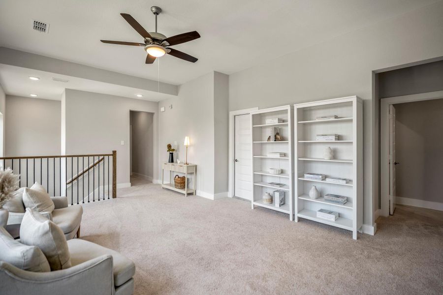 This spacious game room is primed for fun, with plenty of room to create your favorite setup for games, hobbies, lounging and everyday play.