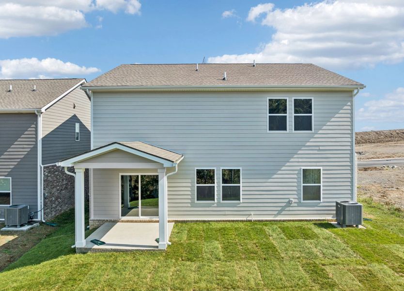 Front exterior of a new home in Cades Bluff, Lebanon, TN, highlighting curb appeal (Image 21).