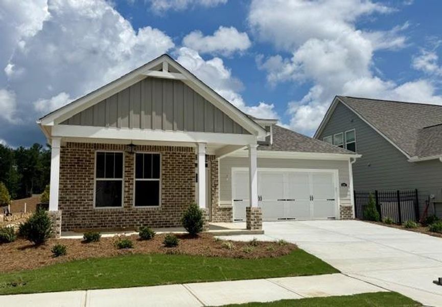 Front exterior of a new home in Echols Farm, Hiram, GA, highlighting curb appeal (Image 25). Front exterior of a new home in Echols Farm, Hiram, GA, highlighting curb appeal (Image 25).