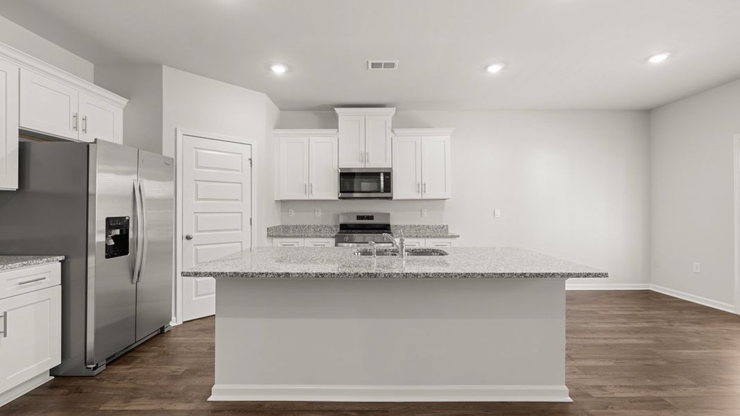 Representative furnished interior of a home built from the Hayden by D.R. Horton in Southwind Village, Evans (Image 6).