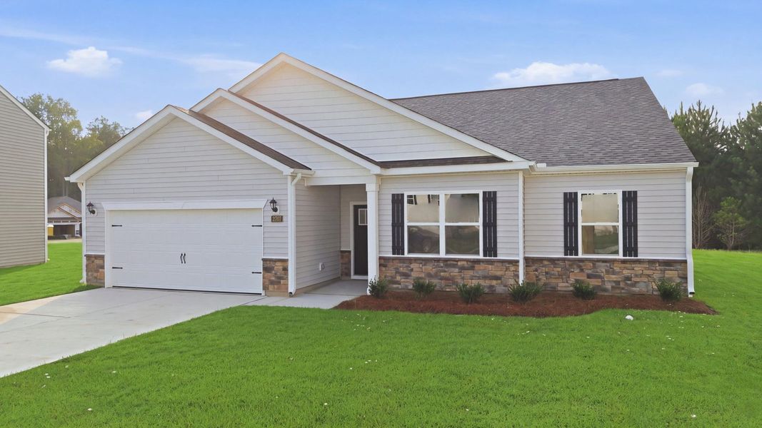 Front exterior of a new home in Villa Grande, Winterville, NC, highlighting curb appeal (Image 17). Front exterior of a new home in Villa Grande, Winterville, NC, highlighting curb appeal (Image 17).