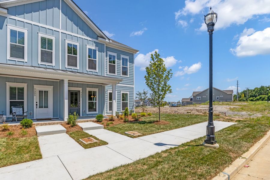 Front exterior of a new home in Carothers Farms, Nolensville, TN, highlighting curb appeal (Image 21).