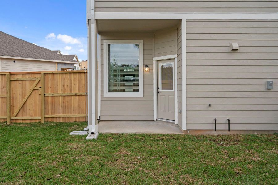 Exterior details and patio area of a home in Woodforest, Montgomery (Image 4).