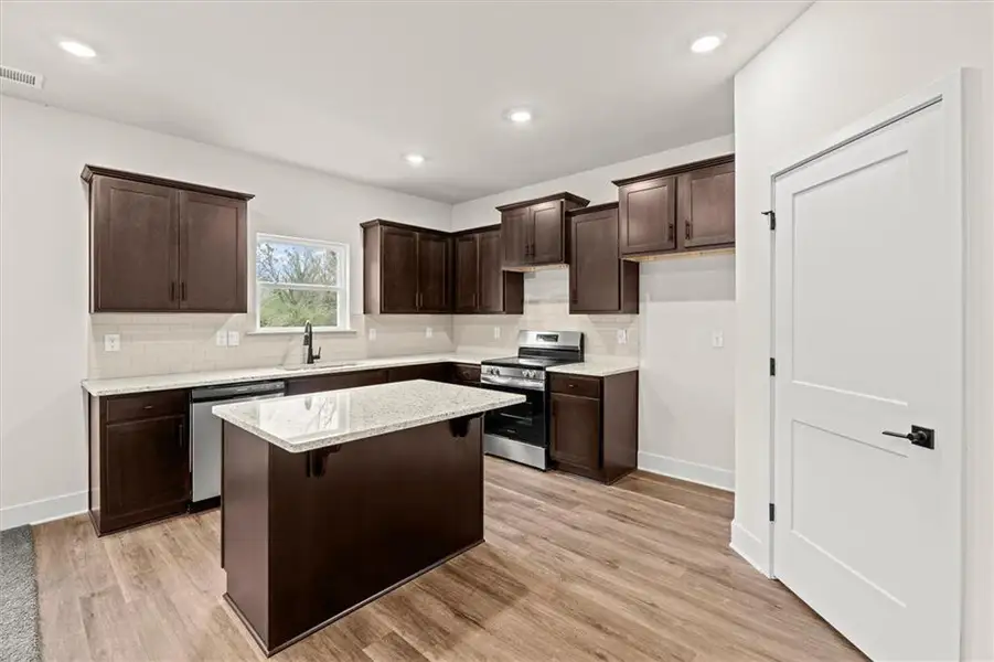 Furnished interior view inside a new home in Canterbury Villas, Carrollton (Image 5).