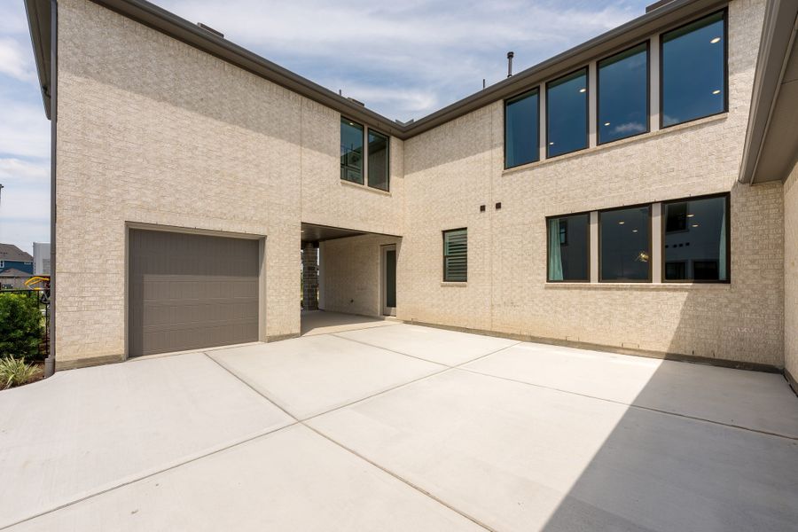 Representative exterior details of a home built from the Camden by Tri Pointe Homes in Bridgeland, Cypress (Image 25).