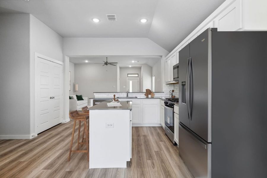 Kitchen in the Amber home plan by Trophy Signature Homes – REPRESENTATIVE PHOTO