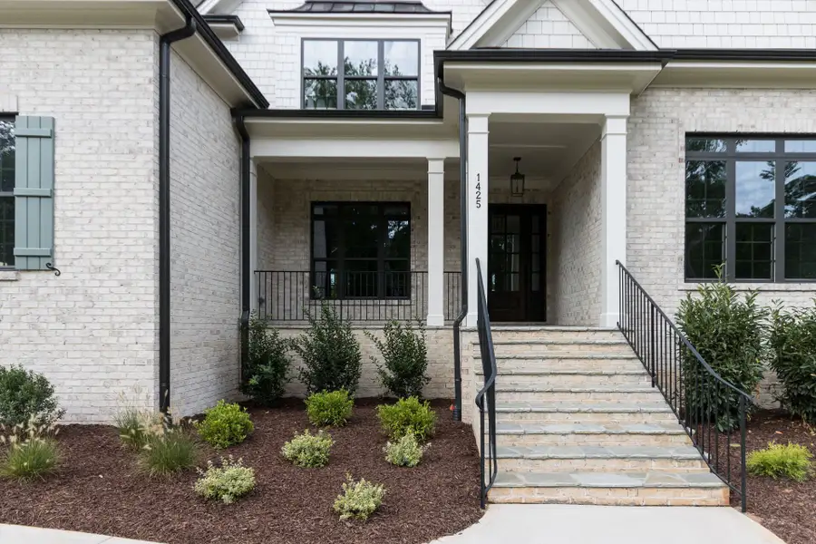 Representative exterior details of a home built from the Shelby Tudor by Homes by Dickerson in Cattail, Clayton (Image 3).